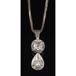 A diamond two stone pendant: with circular brilliant-cut diamond approximately 0.