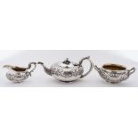 A William IV silver three-piece tea service, maker Robert Hennell II, London, 1931: crested,