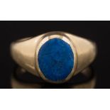 A 9ct gold and lapis lazuli single stone signet ring:, ring size J 1/2.