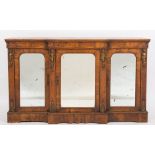 A Victorian walnut, inlaid and gilt metal mounted breakfront side cabinet:,