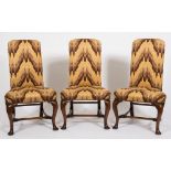 A set of three early 18th Century walnut frame side chairs:,