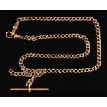 A 9ct gold curb link watch chain: with attached T-bar, 30gms gross weight.