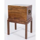 An early 19th Century mahogany and inlaid rectangular cellarette:, bordered with boxwood lines,