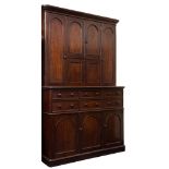 A Victorian mahogany housekeeper's cupboard:, the upper part with a moulded cornice,