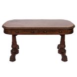 An early Victorian mahogany library table:, of rectangular shape with rounded ends,