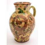 A Donyatt pottery jug: of oviform with raised neck and pinched spout,