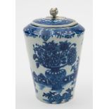 A Worcester blue and white tea canister and cover: of tapering cylindrical form with flower finial,