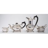 A matched silver four-piece tea service, maker Walker and Hall, Birmingham, 1917/18,