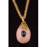 A sapphire and diamond mounted egg-shaped pendant: on chain.