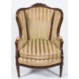 A French carved beechwood armchair:,