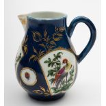 A Worcester sparrow beak milk jug: painted with exotic birds and insects in fan and circular shaped