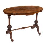 A Victorian walnut and inlaid oval-shaped centre table:,