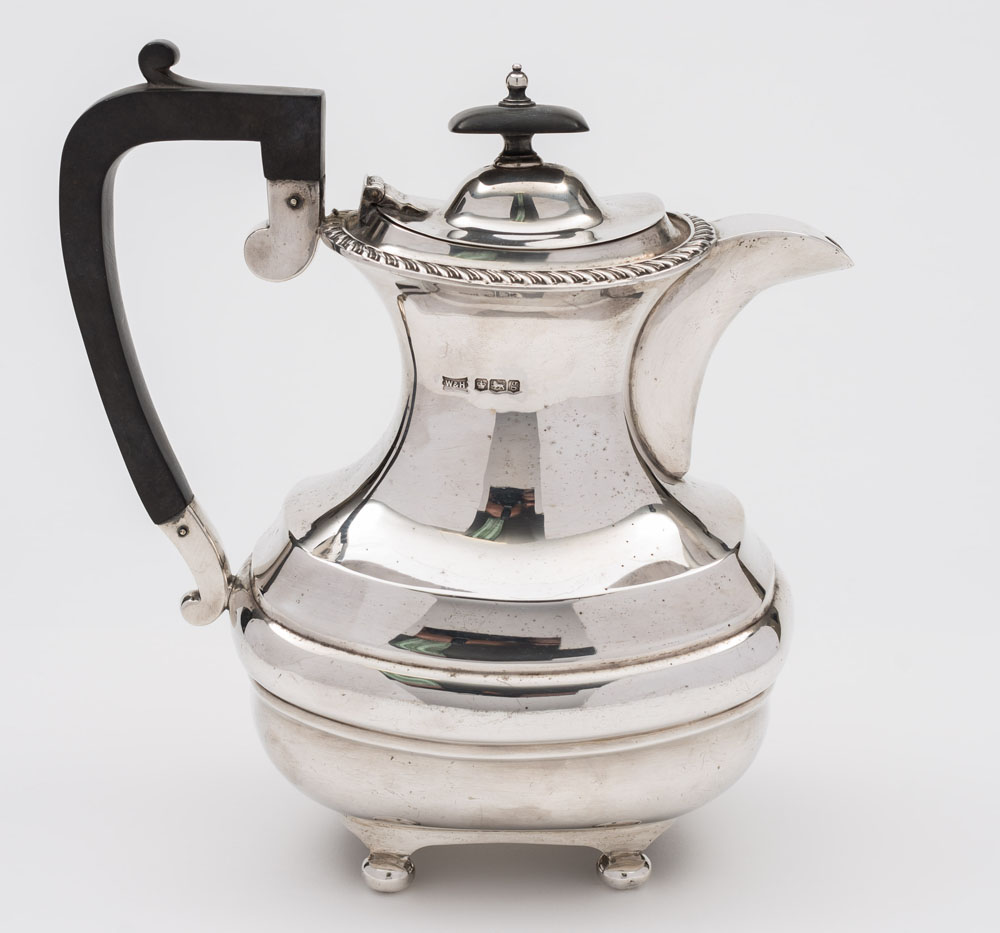 A George V silver coffee pot, maker Walker & Hall, Sheffield,
