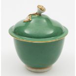 A Worcester solid apple green ground sucrier and cover: the domed cover with gilded flower and leaf