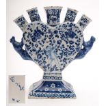 A Dutch blue and white delftware tulip vase: the heart shaped body with five nozzles and crouching