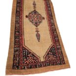 A Serapi rug:,