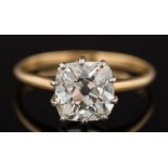 A diamond single-stone ring: with cushion-shaped old brilliant-cut diamond approximately 8.