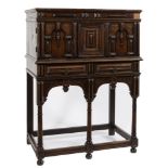 An 18th Century French walnut cabinet on a later stand:,