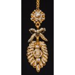 A gold and seed pearl cannetille pendant: of open work design, on 9ct gold fine-link chain,