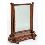 A Victorian mahogany swing frame toilet mirror:, with a rectangular plate and turned uprights,