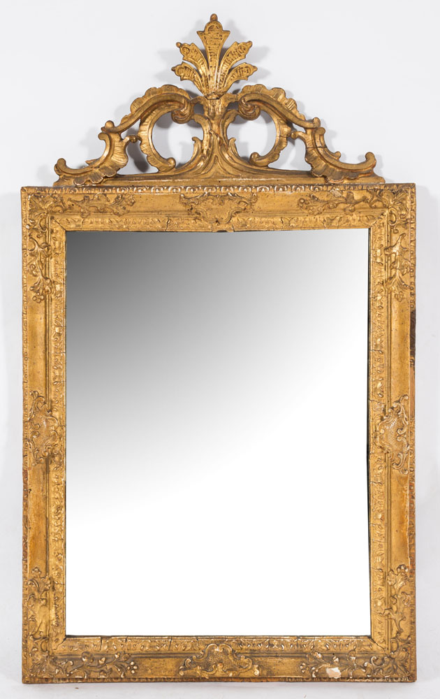 A 19th Century carved giltwood and gesso rectangular mirror:, with pierced foliate scroll,