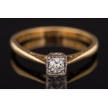 A square-set diamond single-stone ring: with circular brilliant-cut diamond approximately 0.