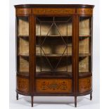 An Edwardian mahogany, satinwood, inlaid and decorated display cabinet:, of D shaped outline,