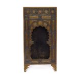 A Persian ornate gilt metal photograph stand: of rectangular outline,