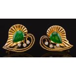 A pair of jade and diamond mounted heart-shaped clip earrings: each with a pear shaped jade and