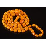 A long amber bead,