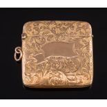 A 9ct gold foliate engraved vesta case: with Birmingham hallmarks, 46mm across,