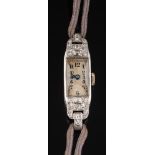 A lady's early 20th Century platinum and diamond mounted cocktail wristwatch: the rectangular dial