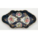 A Worcester lobed hexagonal spoon tray: painted with circular and fan shaped panels of European