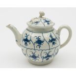 A Worcester blue and white teapot and cover: of globular form with flower finial,