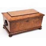 A Victorian burr walnut tea caddy: of sarcophagus outline,