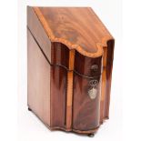 A Georgian mahogany satinwood crossbanded and chequer strung cutlery box: of serpentine outline,