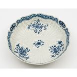 A Worcester blue and white junket dish: moulded with cartouches amongst basket weave,