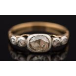 A gold and rose diamond five stone ring: the principal stone approximately 7mm long x 5.