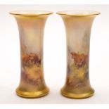 A pair of Royal Worcester vases painted by Harry Stinton: of trumpet form,