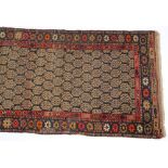 A Feraghan runner:, the shaded field with an all over geometric boteh design,