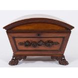 By Mack, Williams & Gibton, Dublin - A William IV carved mahogany domed cellarette:,