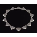 A triangle-link necklace designed by Bent Gabrielsen for Hans Hansen:, Denmark circa 1960,