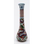 A Chinese wucai porcelain calligraphy brush handle: of slender elongate form decorated in under