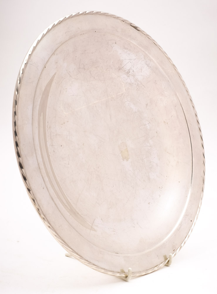 A sterling silver dish, stamped Towle, Sterling, 144: of plain circular form with a spiral edge,