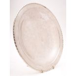 A sterling silver dish, stamped Towle, Sterling, 144: of plain circular form with a spiral edge,