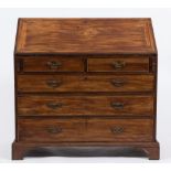 A George III mahogany bureau:,