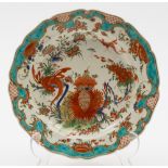 A Worcester 'Jabberwocky' pattern plate: painted with a dragon by a banded hedge and flowers and