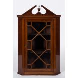 A 19th Century mahogany and inlaid hanging corner display cabinet:,