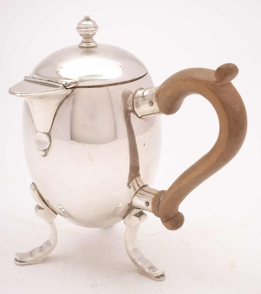 A George V Britannia Standard silver chocolate pot, maker Lionel Alfred Crichton, London,