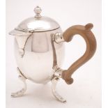 A George V Britannia Standard silver chocolate pot, maker Lionel Alfred Crichton, London,